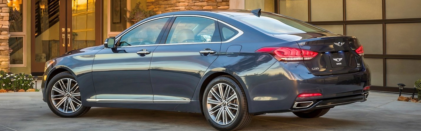 Genesis parked with a Rear Driver side view