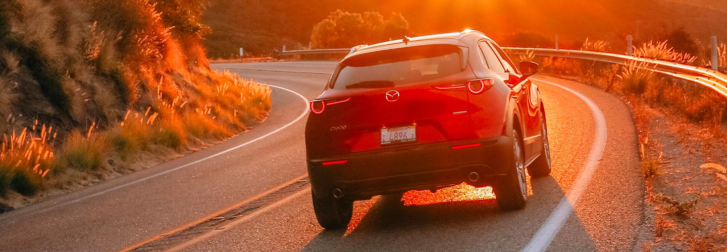Rear view of the 2020 Mazda Cx-30 in motion