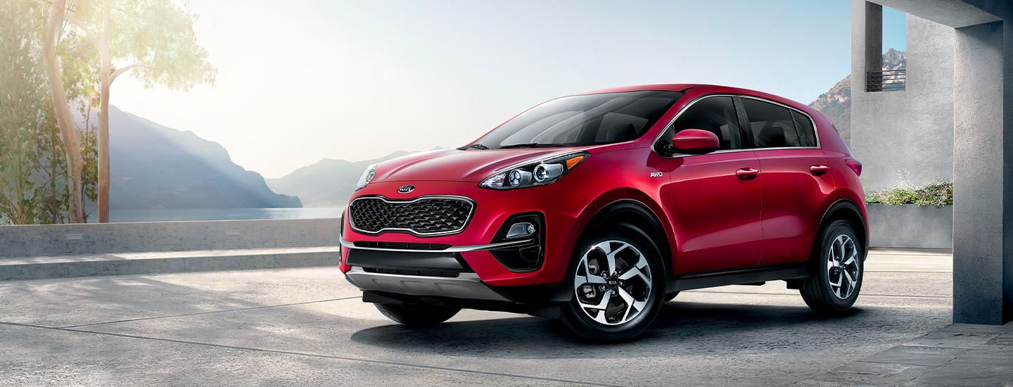 Red 2020 Kia parked near the water