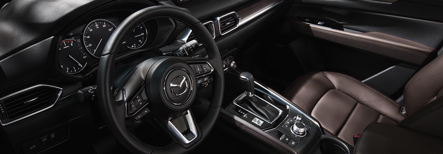 Drivers side perspective of the of inside the 2020 Mazda CX-5