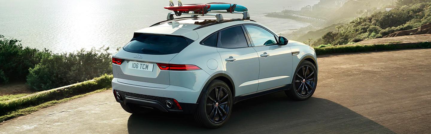 2020 Jaguar carrying a surfboard