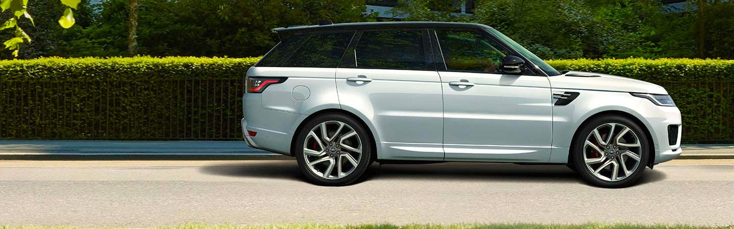 Passenger side profile of a white 2020 Range Rover Sport