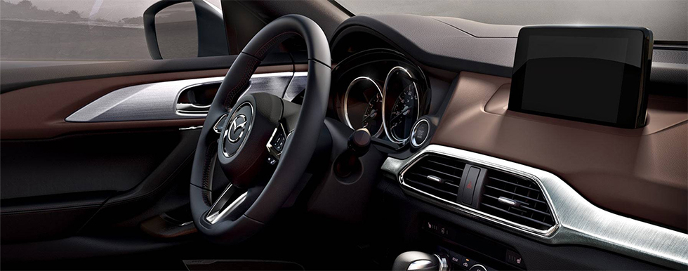Safety features and interior of the 2018 Mazda CX-9 - available at our Mazda dealership near Manchester, NH.