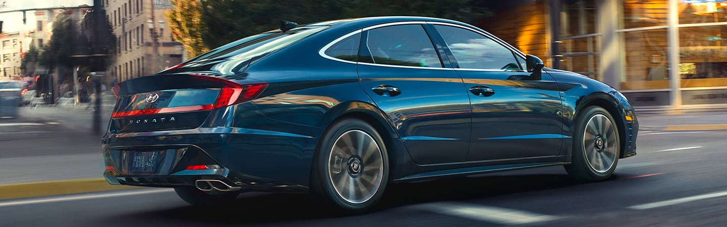 Rear passenger’s side view of blue Sonata