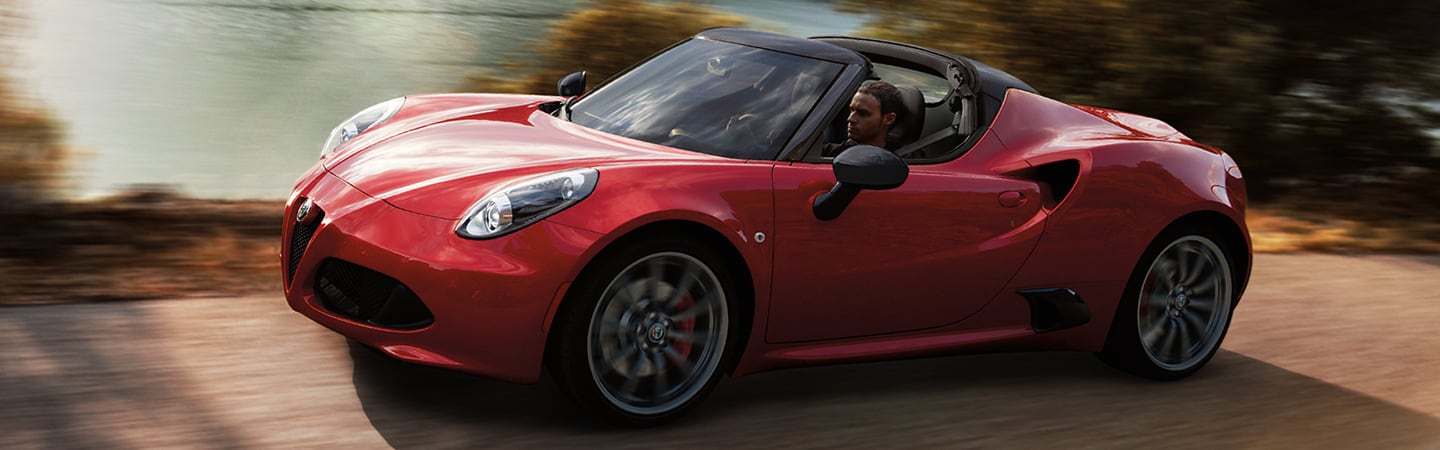 Red 2019 Alfa Romeo 4C Spider in motion