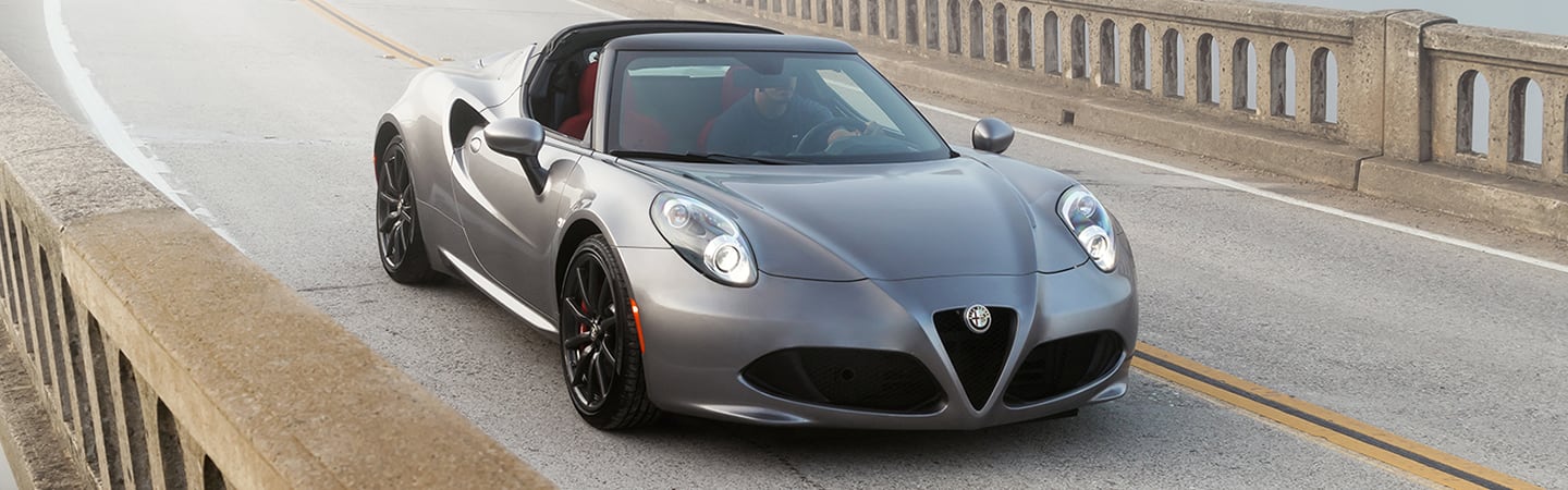 Front view of the 2019 Alfa Romeo 4C Spider driving on the highway