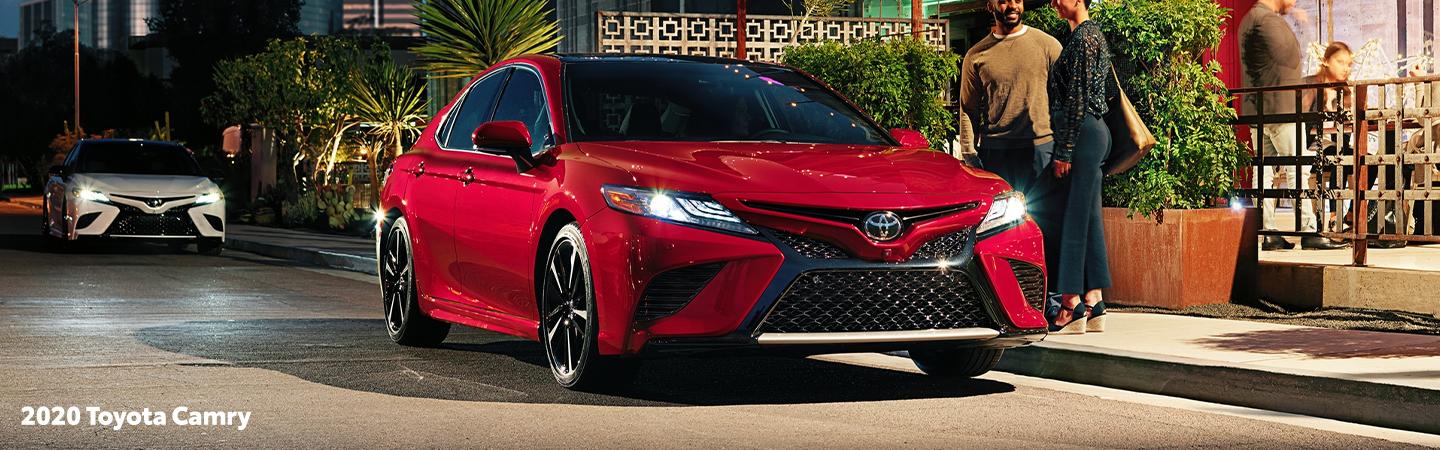 Red 2020 Toyota Camry parked on the street