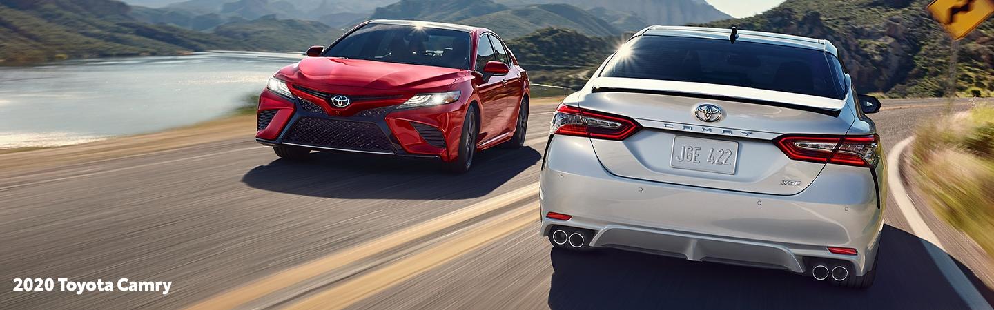 Two 2020 Toyota Camry vehicles in motion