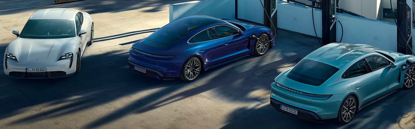 Three 2020 Taycan parked 