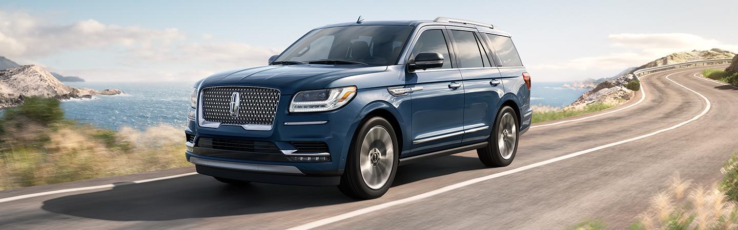 Side view of the 2020 Lincoln Navigator in motion outside of Wilkes-Barre, PA