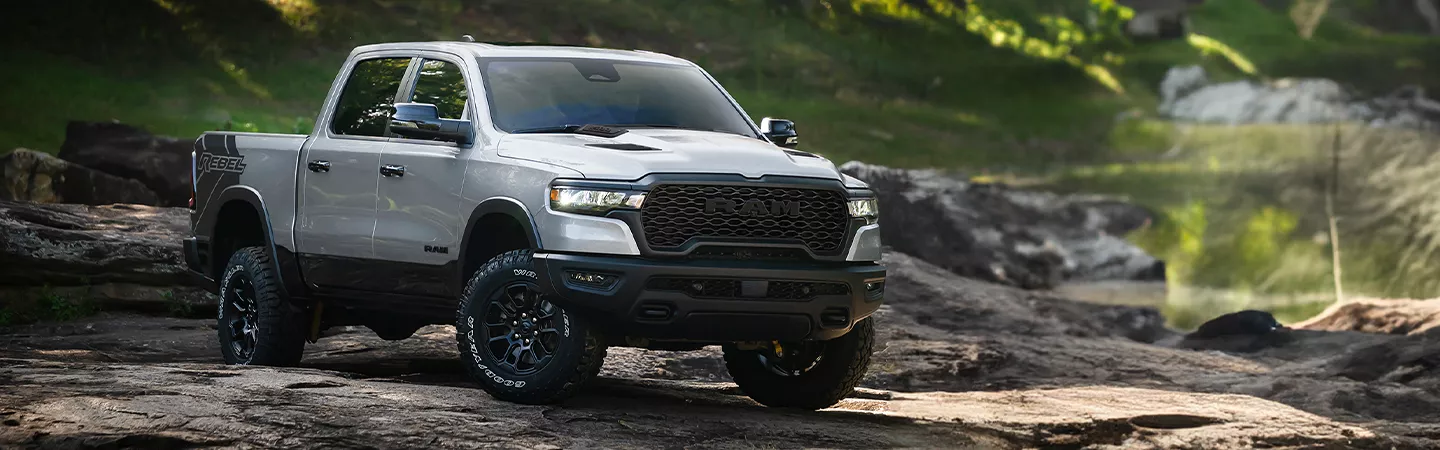 2026 RAM 1500 driving on a mountain