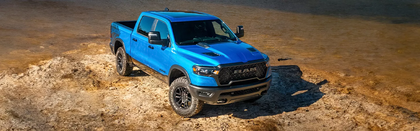 2026 RAM 1500 parked on a dirt road