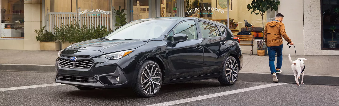 2026 Subaru Impreza parked in a parking spot, front view