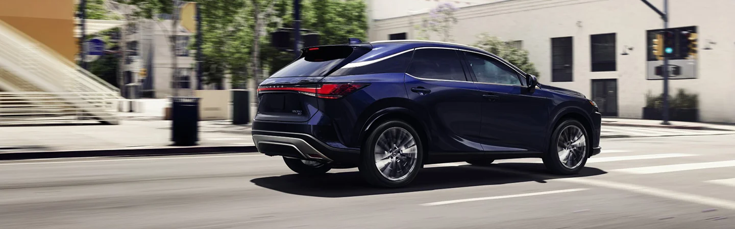 2025 Lexus RX blue color car runing in the city