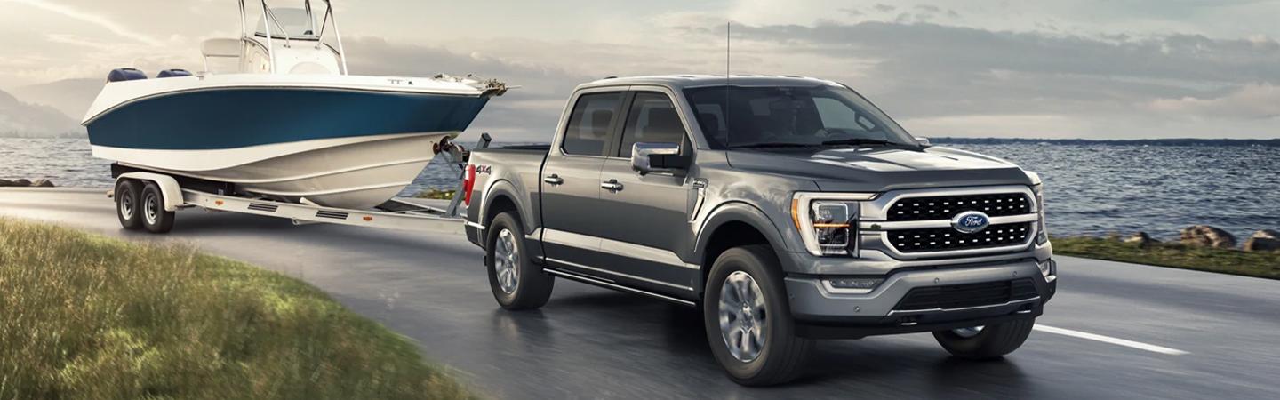 A Ford F-150 towing a boat