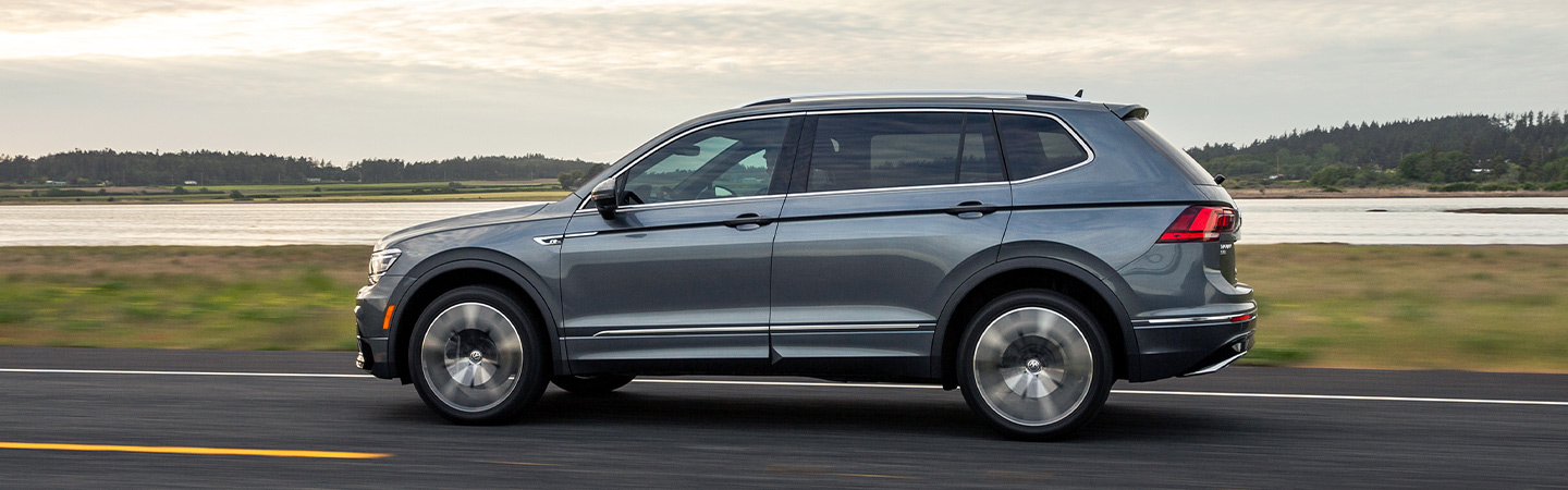 Left side profile of a gray Volkswagen Tiguan