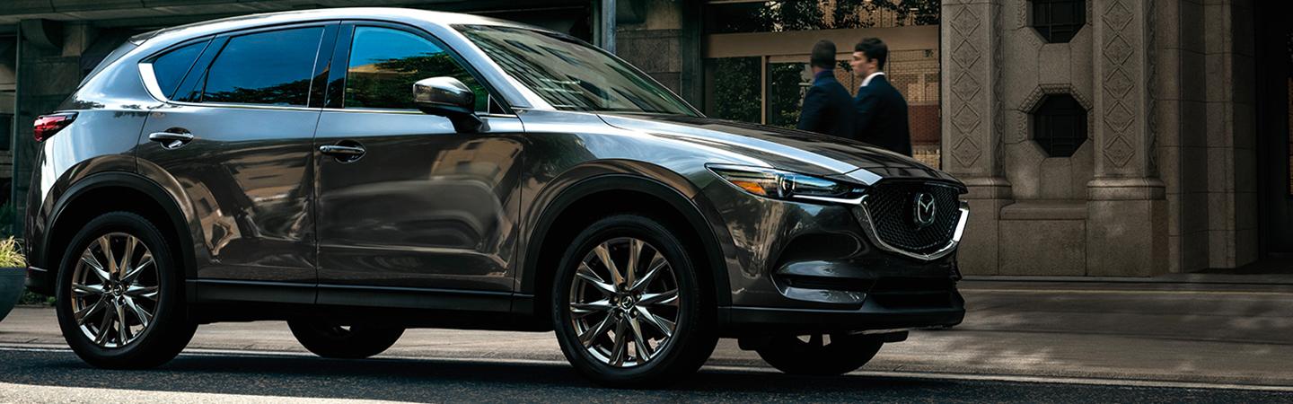 Front view of a Mazda vehicle parked