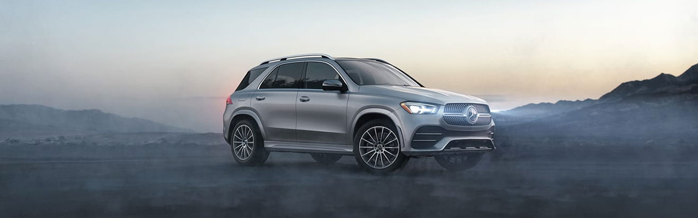 Passenger side profile view of a Mercedes Benz SUV