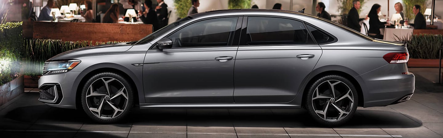Driver’s side profile of gray Passat