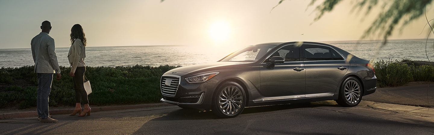 Genesis G90 parked by the ocean