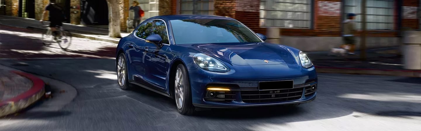 Blue Panamera in motion