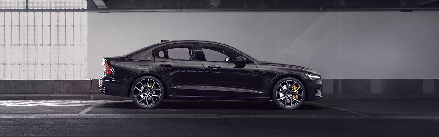 Side view of the 2021 S60 Volvo parked in a garage