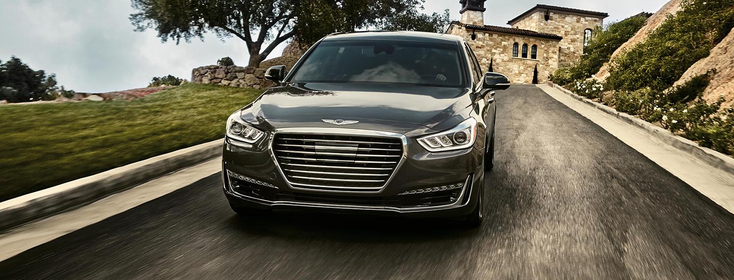 Silver G90 driving in the countryside