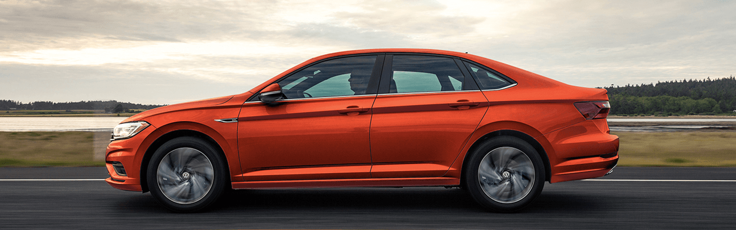 Side profile of the 2021 Volkswagen Jetta in motion