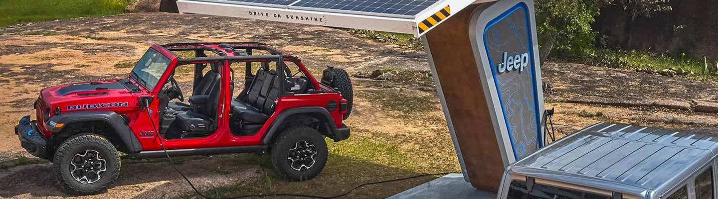 red Jeep Wrangler charging up