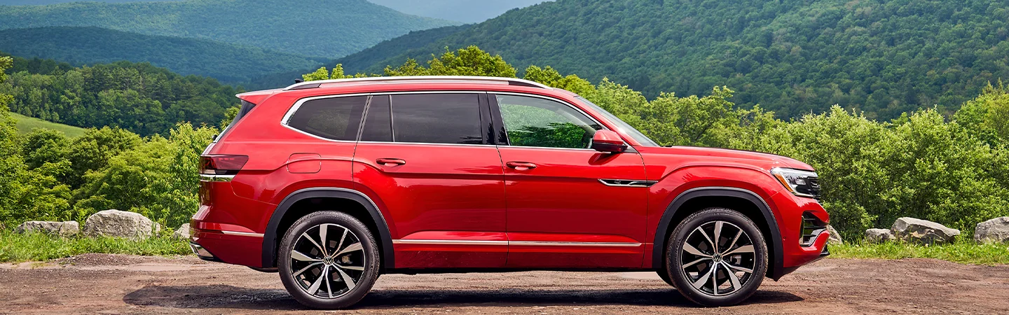 VW SUV Comparison red color car stand on mountain