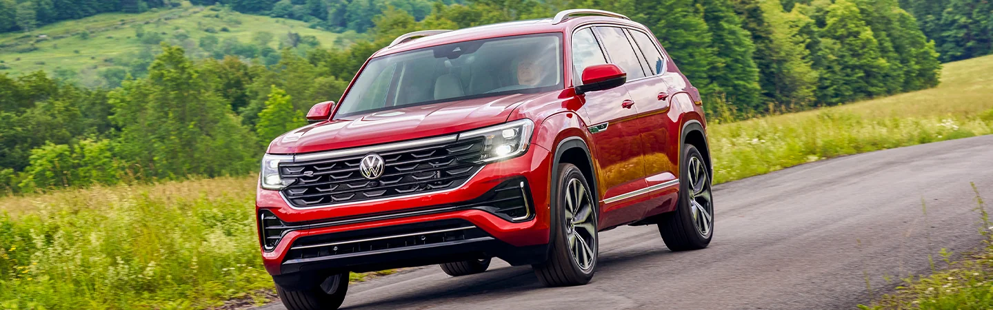 VW SUV Comparison red color car on road