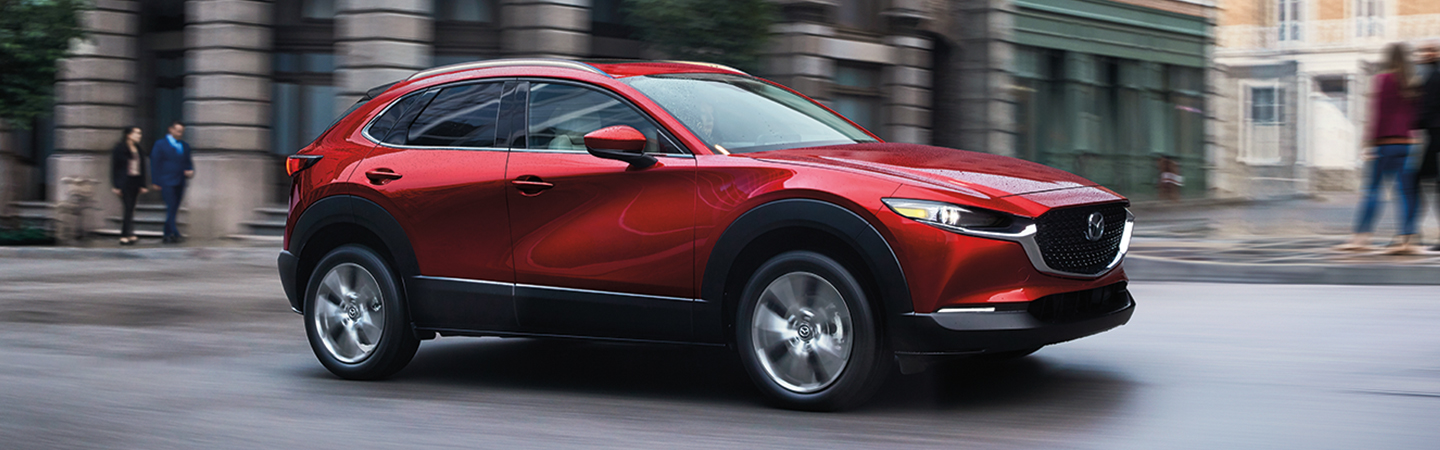 red Mazda on street