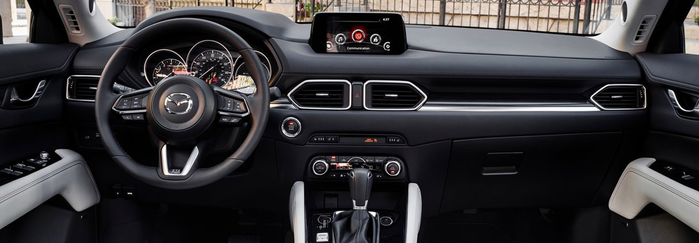 Driver and passenger side perspective inside the 2019 Mazda CX-5
