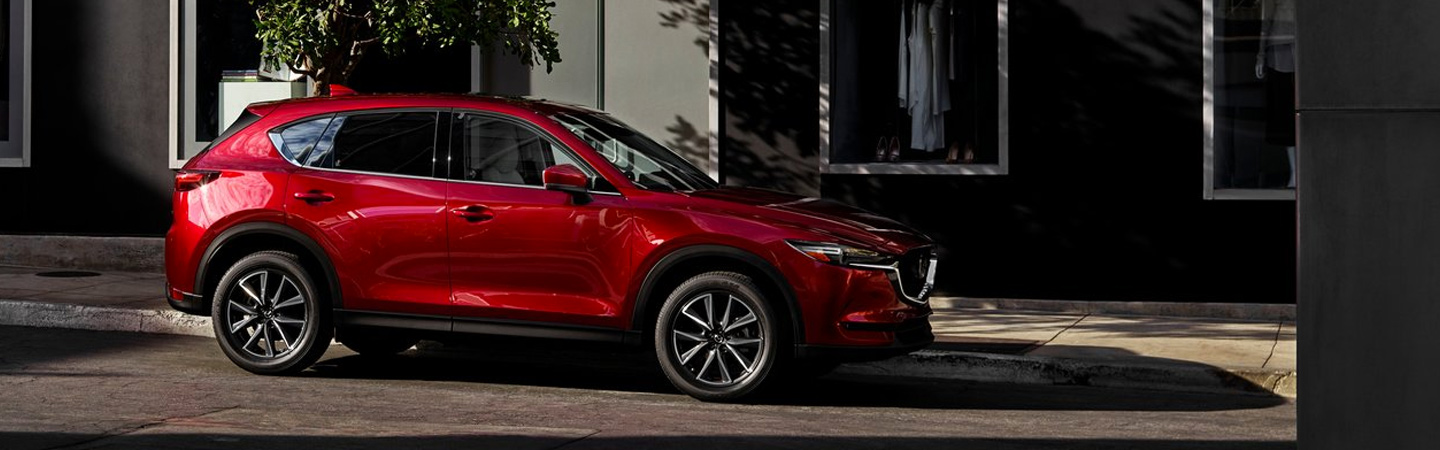Left side of the 2019 Mazda CX-5 parked in the road