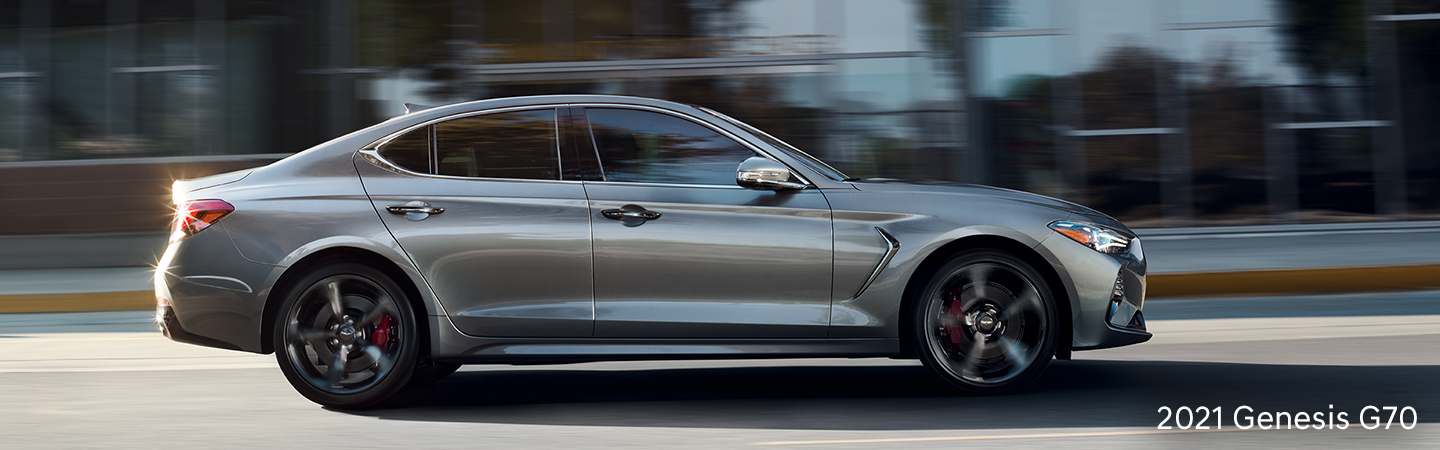 Side profile of the 2021 Genesis G70 in motion