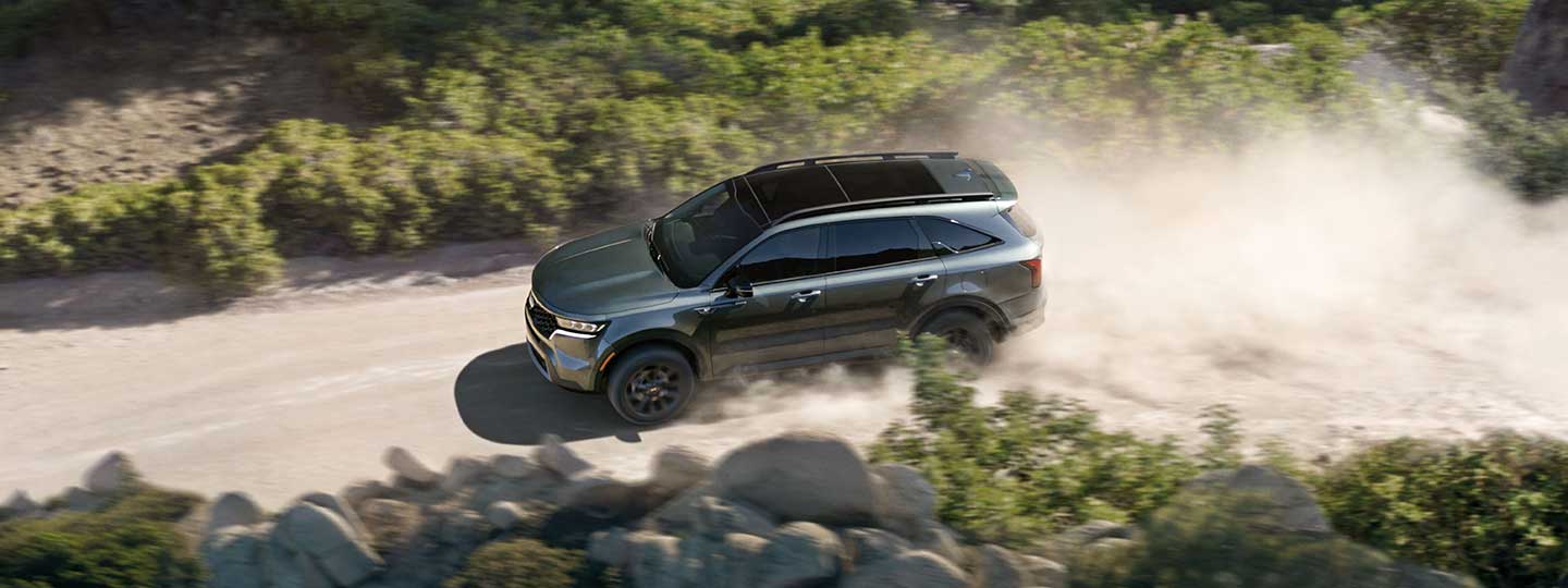 Sorento driving down the dirt road