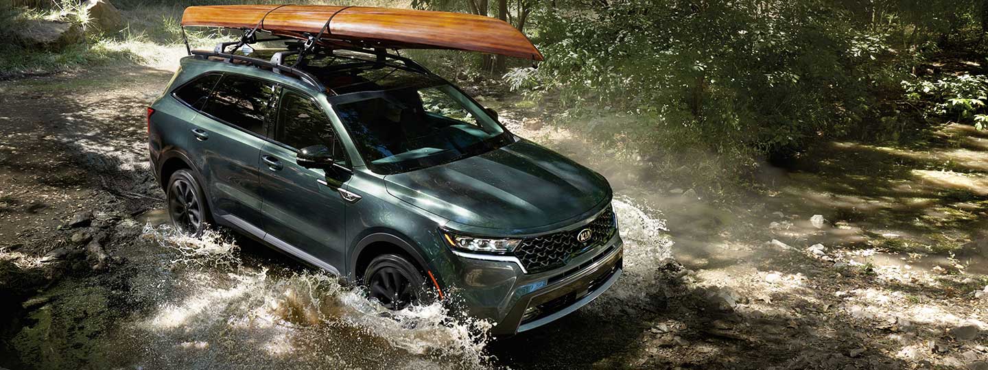 Aruba Green Sorento driving through water