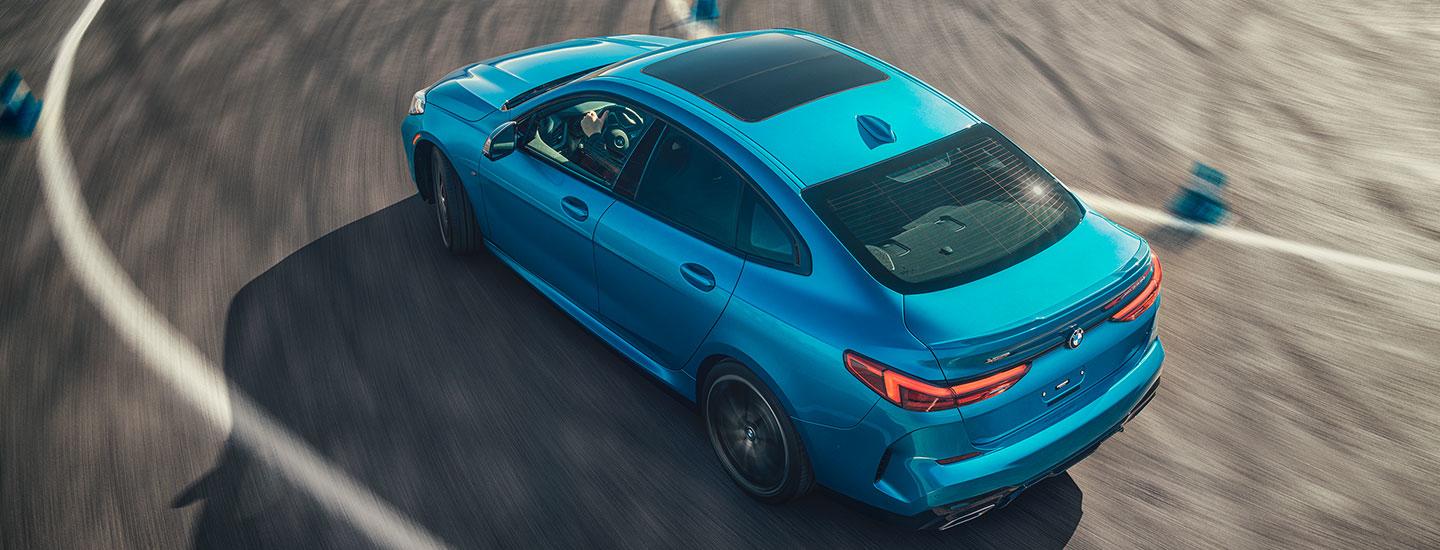 Overhead view of a blue BMW 2 Series showing the moonroof