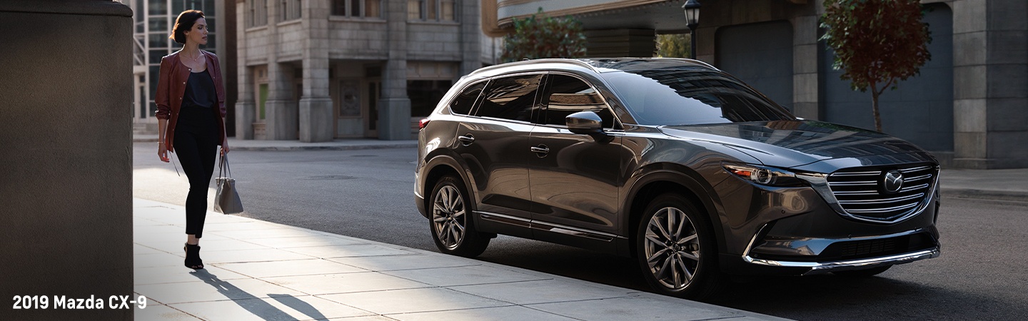 Side view of the 2019 Mazda CX-9 parked on the side of the curb