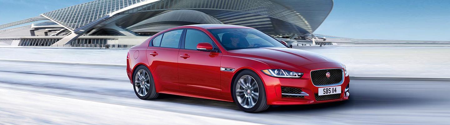 red Jaguar on highway