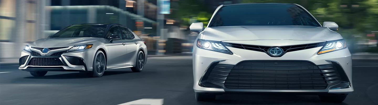 2 New Toyotas front view in motion