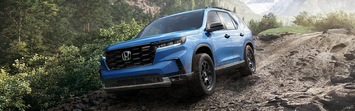 2025 Toyota Highlander Comparison Blue Color Car on Offroad Front View