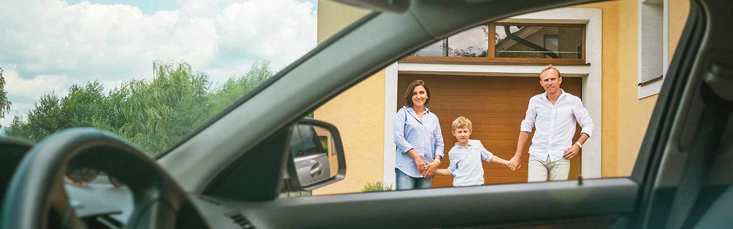 View from car window Family walking towards car