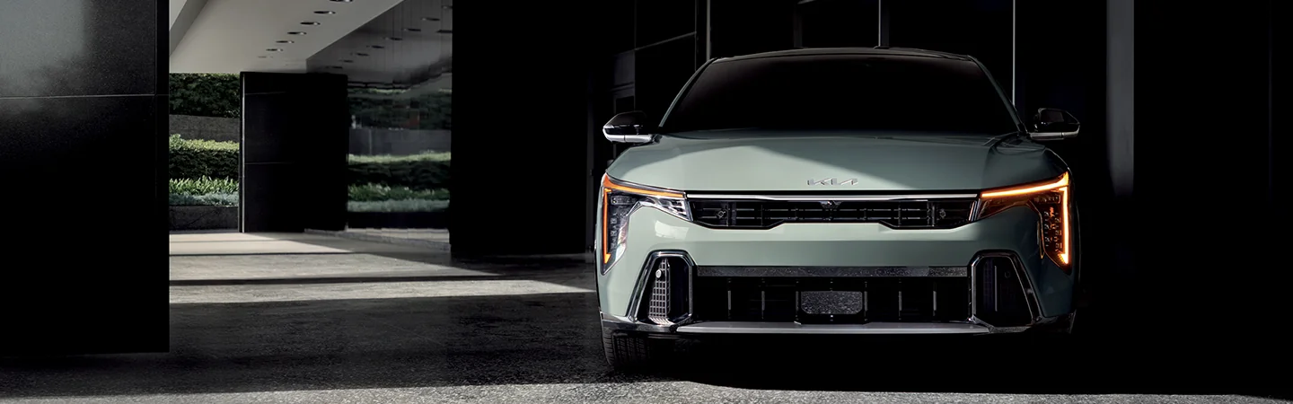 Gray 2025 Kia K4 parked in the parking lot