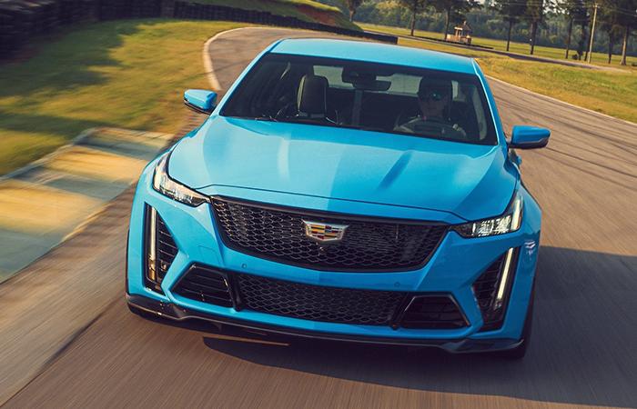 Front view of a 2022 Cadillac CT5 driving on a road