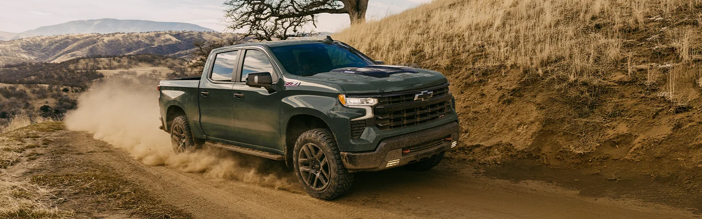 2025 Toyota Tundra Specs green color truck stand on mountain