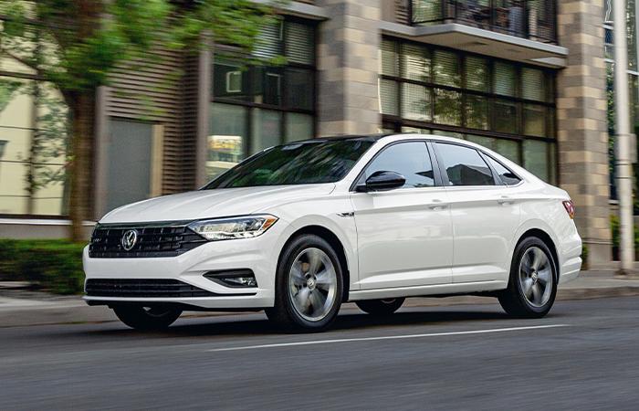 White VW Jetta in motion