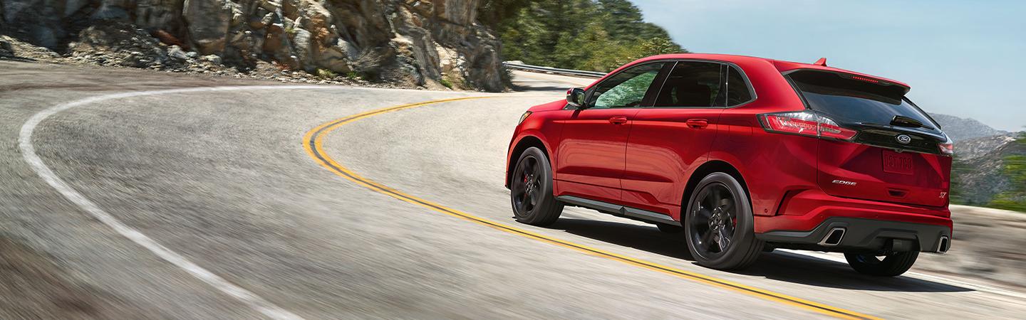 Red 2020 Ford Edge in motion