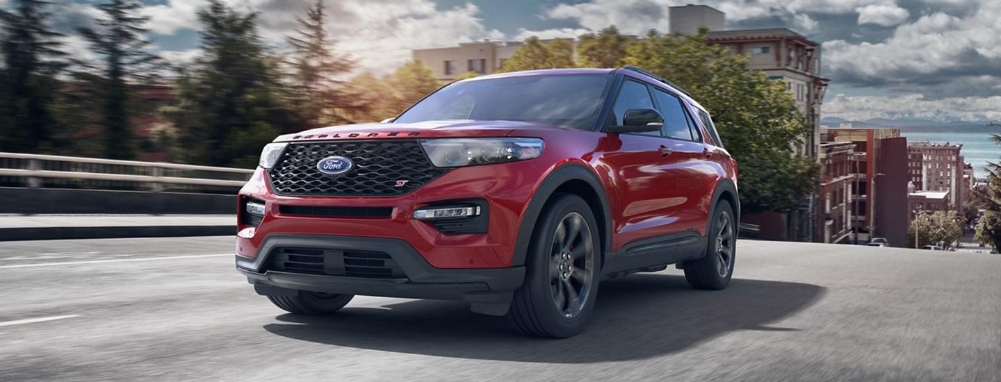 Red 2021 Ford Explorer in motion