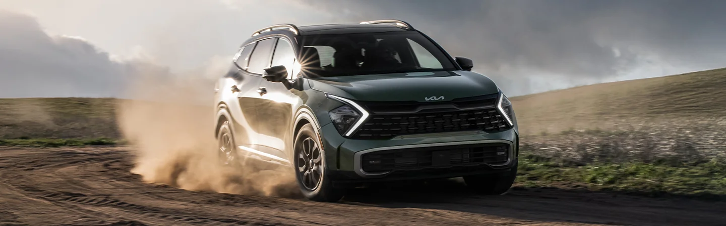2025 Kia Sportage X-Pro Prestige offroad in driving in sand in Leesburg FL